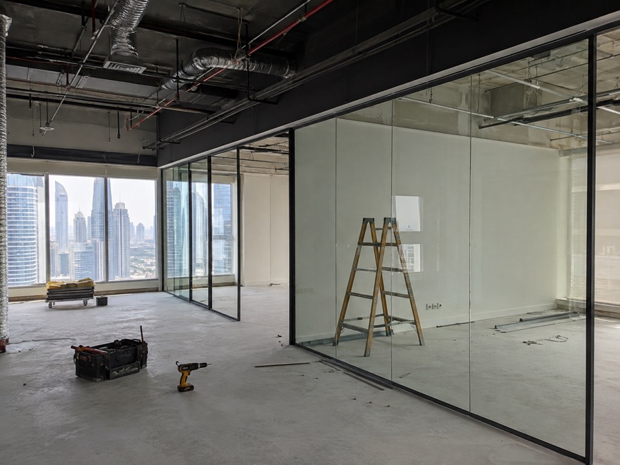Office fit-out with glass partitions under construction